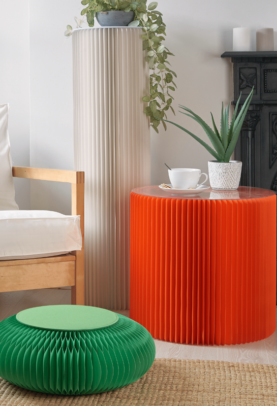 Round green stool and tall orange side table