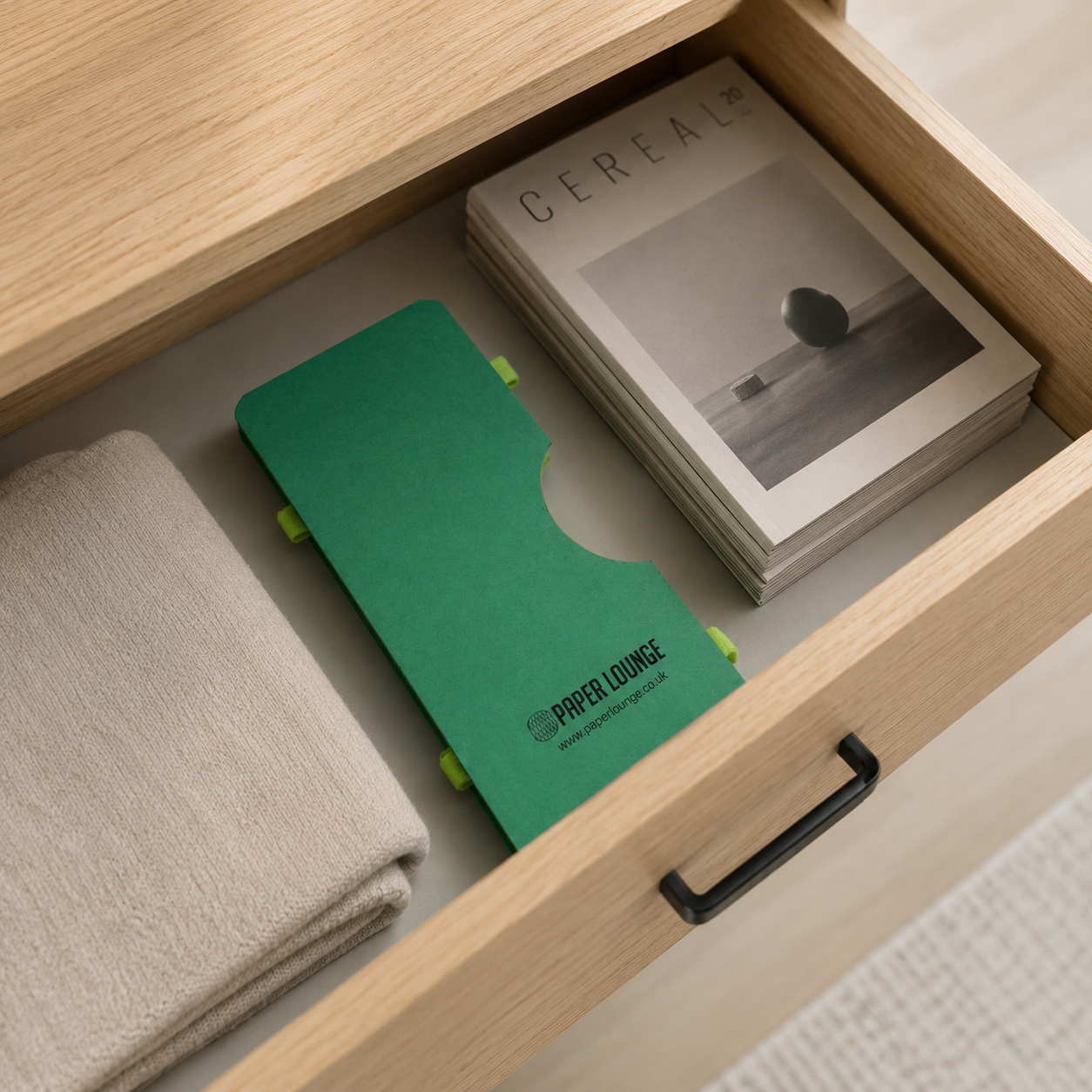 Flat pack paper furniture folded in a draw