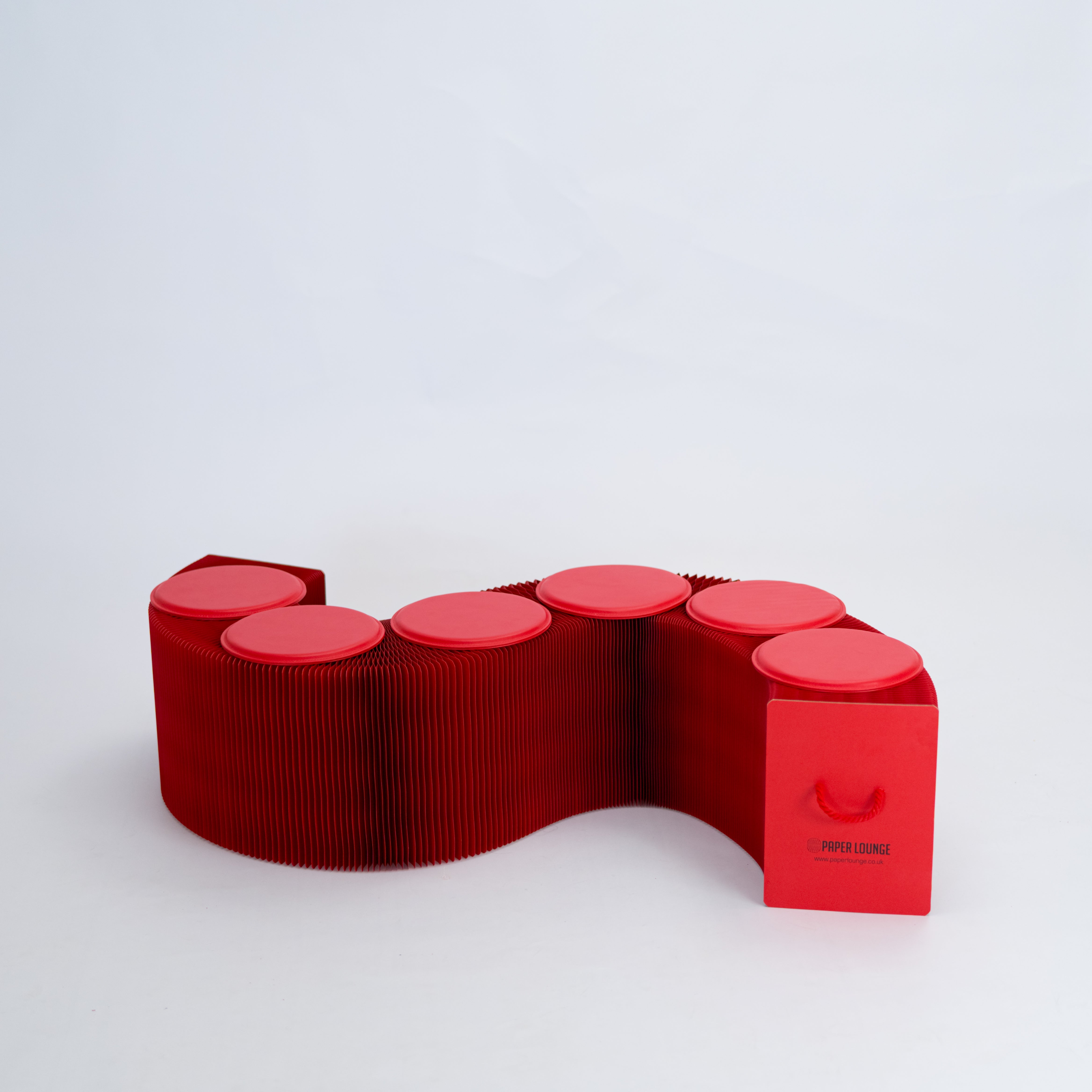 Foldable paper benches, durable and stylish, offering eco-friendly seating for any space.